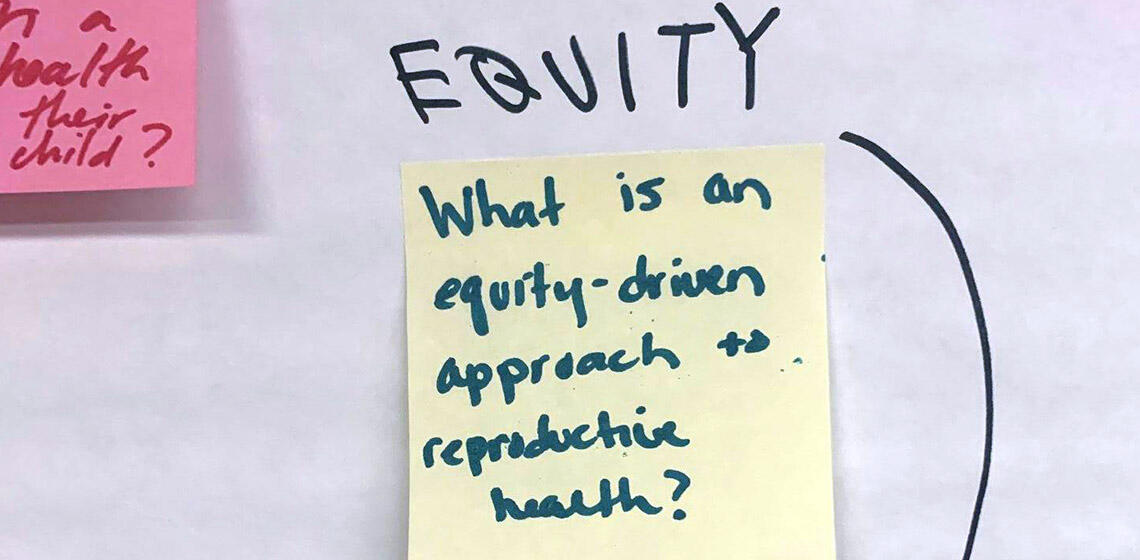 MCAH activity with post it note "what is an equity-driven approach to reproductive health?"